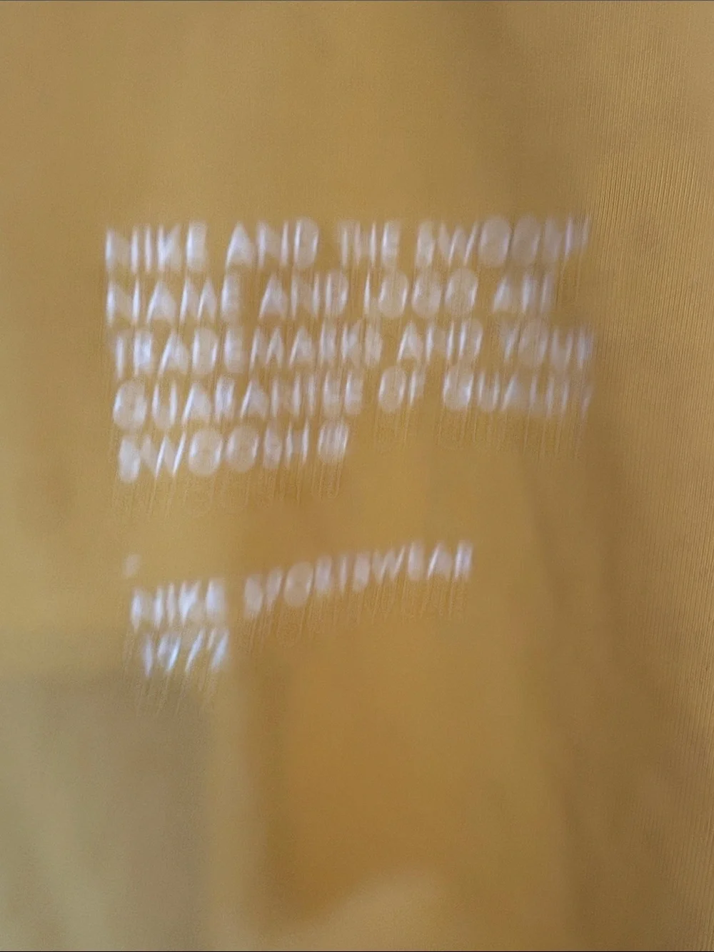 Nike Men’s Crewneck Sweatshirt in Mustard Yellow with White Swoosh Sleeve